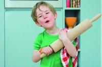 Boy with a rolling pin